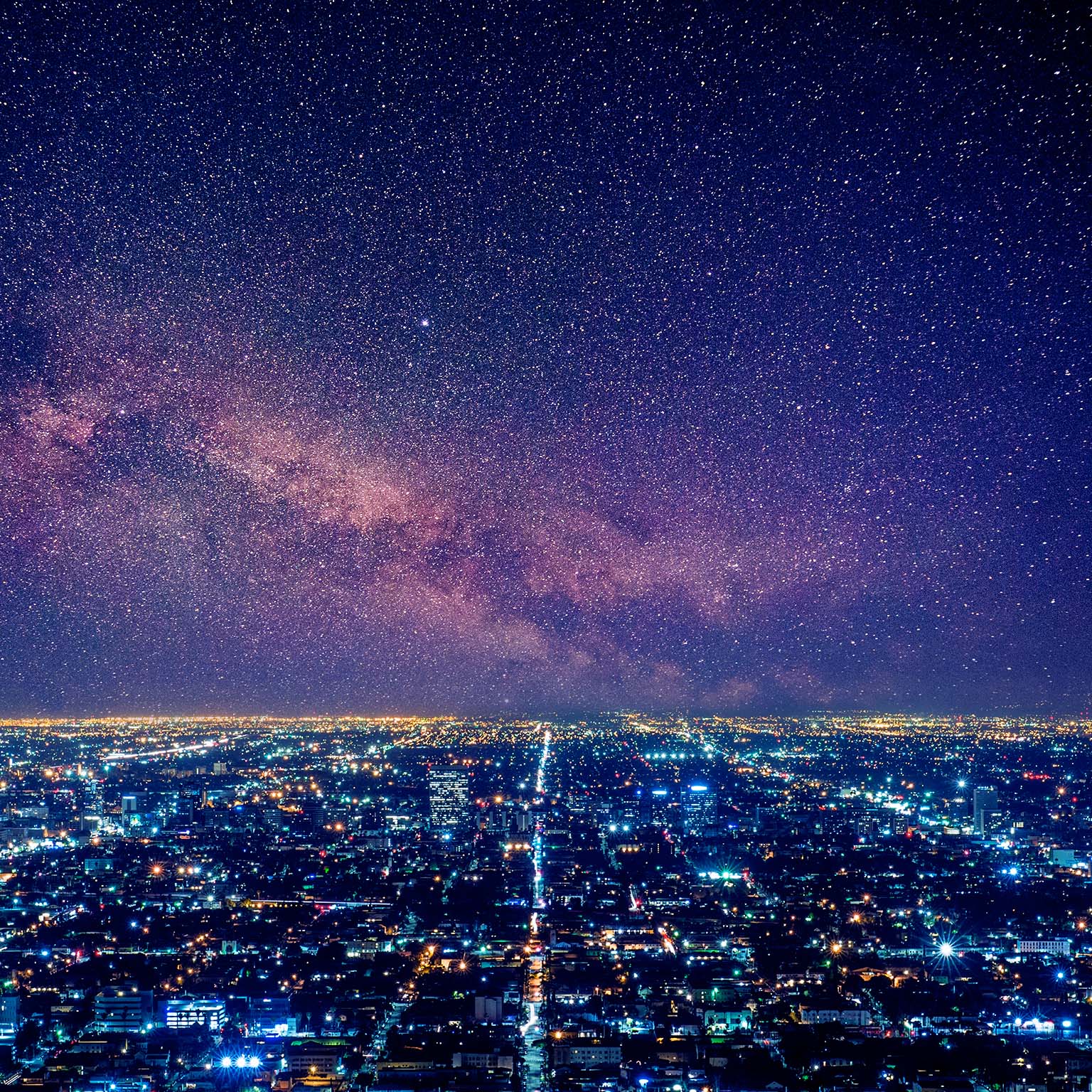 Overhead night-sky view of a large metropolis 