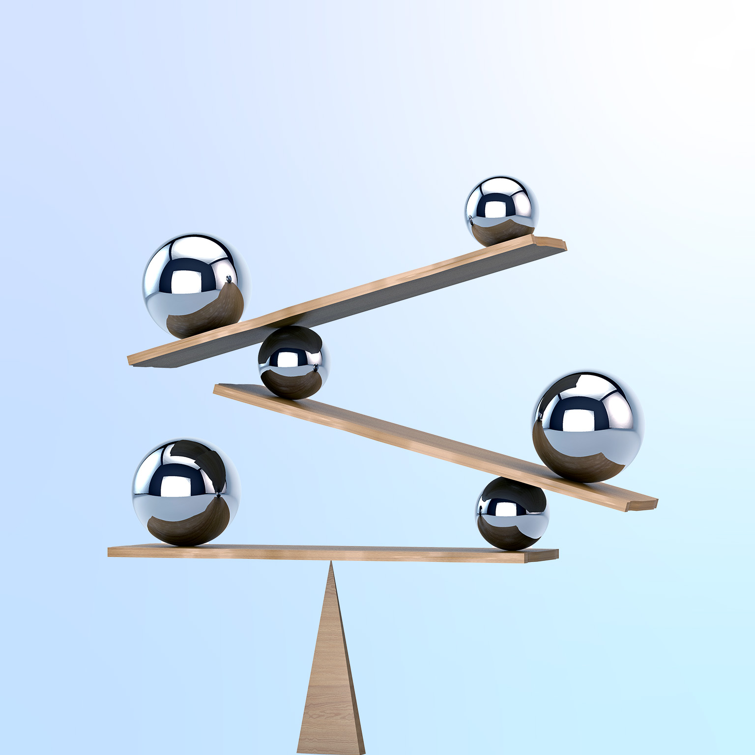 Multilayered balance board with multiple chrome spheres of different sizes creates a dynamic equilibrium.